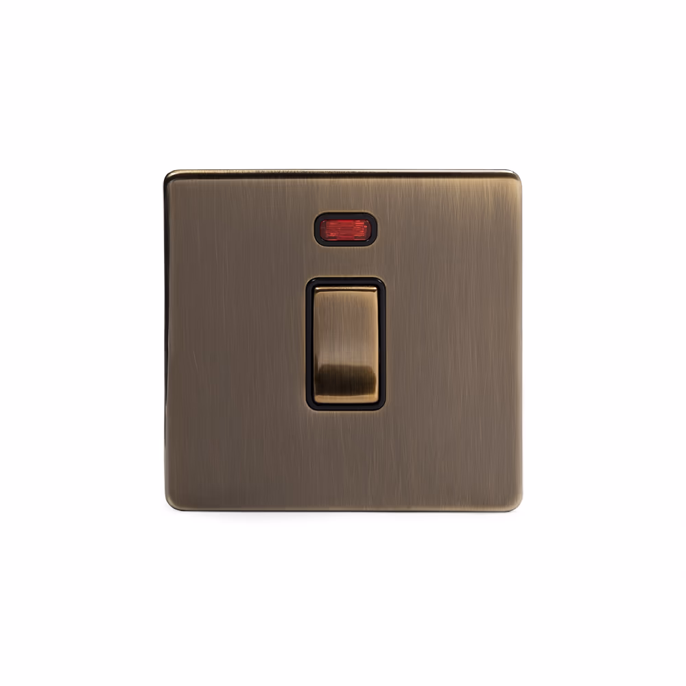 The Charterhouse Collection 20A 1 Gang Double Pole Switch With Neon Blk Ins Screwless Antique Brass